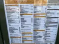 Menu McDonald's z cenami hamburgerów, zestawów i napojów.